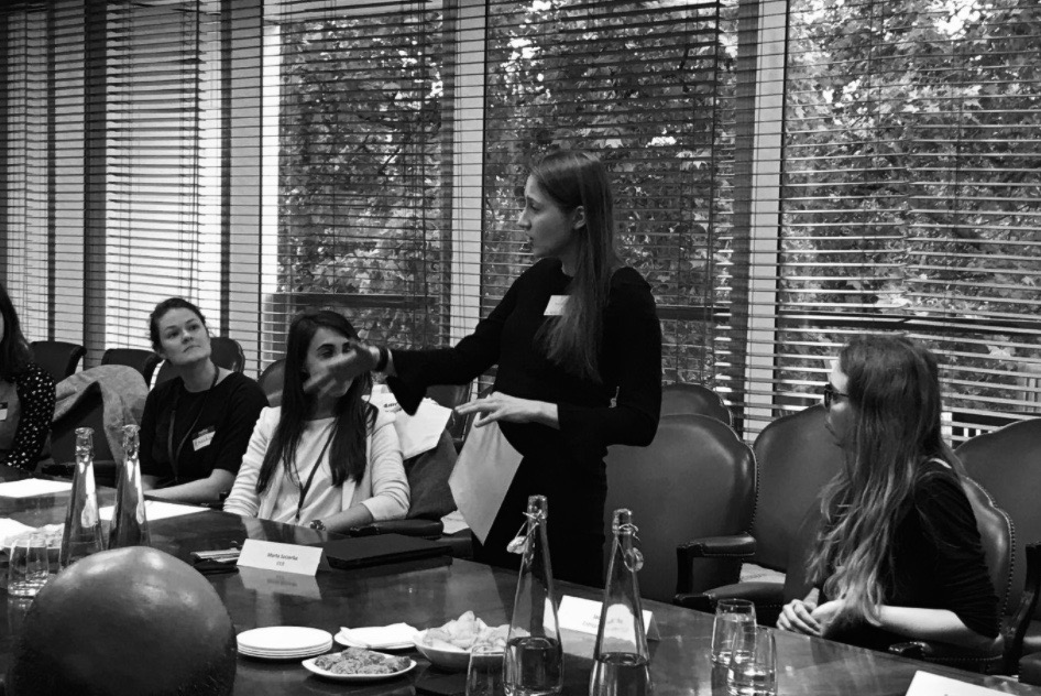 Women at a board table KKR Event